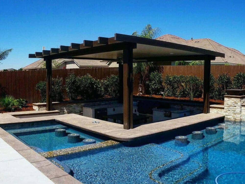 Dark-brown lattice patio cover over a backyard pool