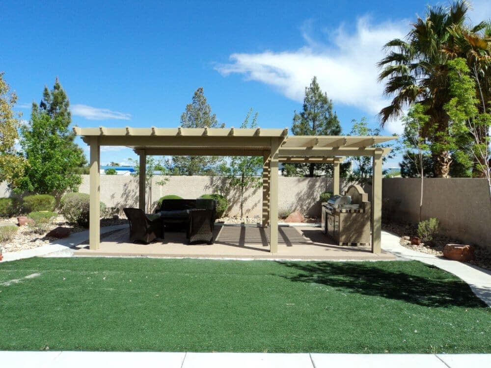 Freestanding lattice patio cover on artificial turf