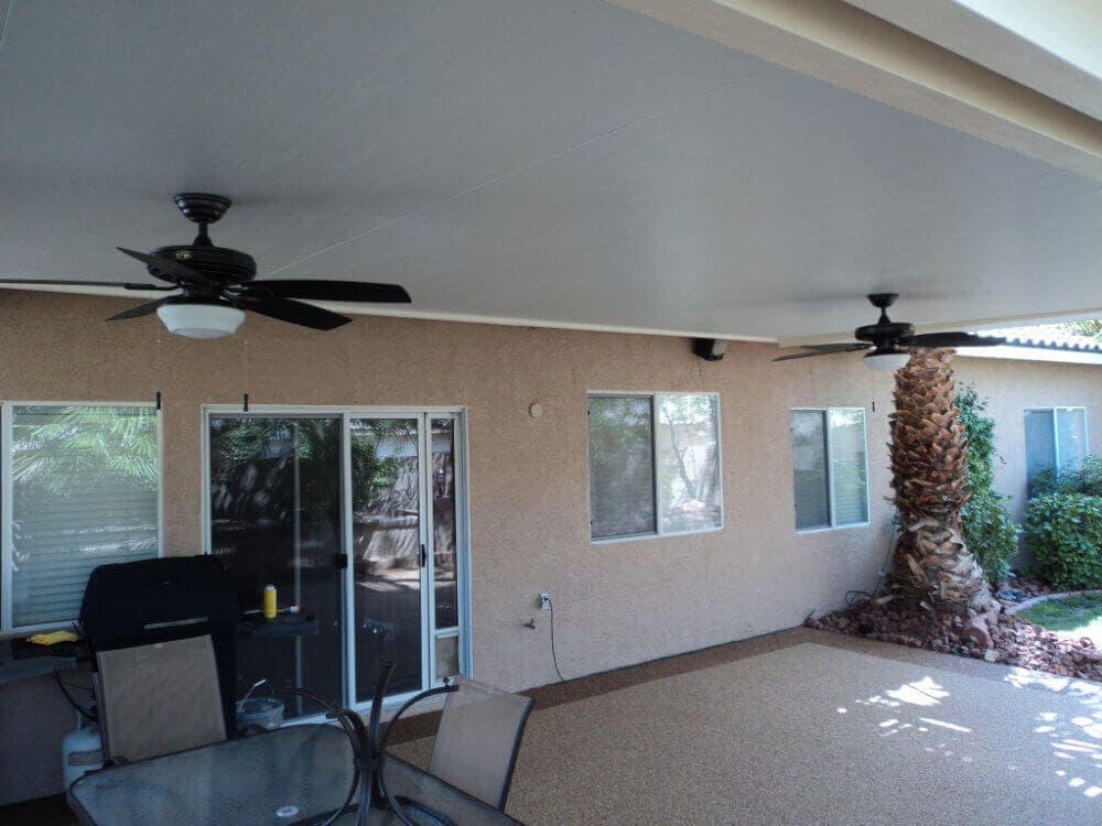 Ceiling fan under a solid patio cover